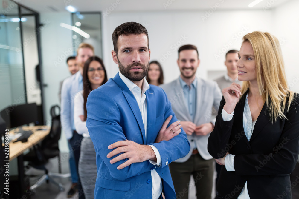 Group picture of business team posing in office Group picture of business team posing in office
