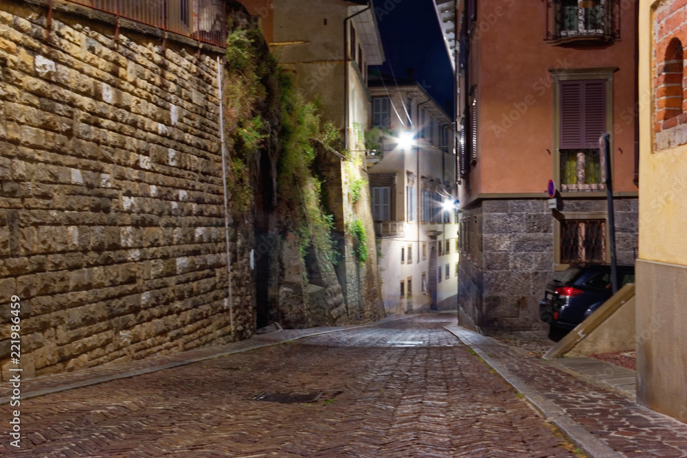 Bergamo, Italy August 18, 2018: on the narrow street of the old. evening city.