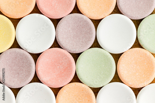 Close up view of circular vitamins or tablets photo