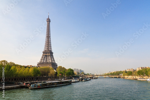 Beautiful view of the Eiffel tower from the Passerelle Debilly bridge in Paris in spring © dennisvdwater