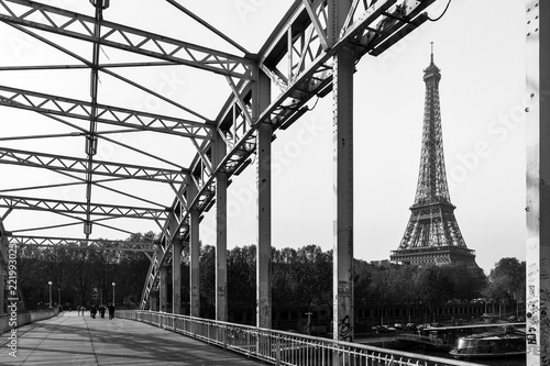 Beautiful view of the Eiffel tower from the Passerelle Debilly bridge in Paris in spring 