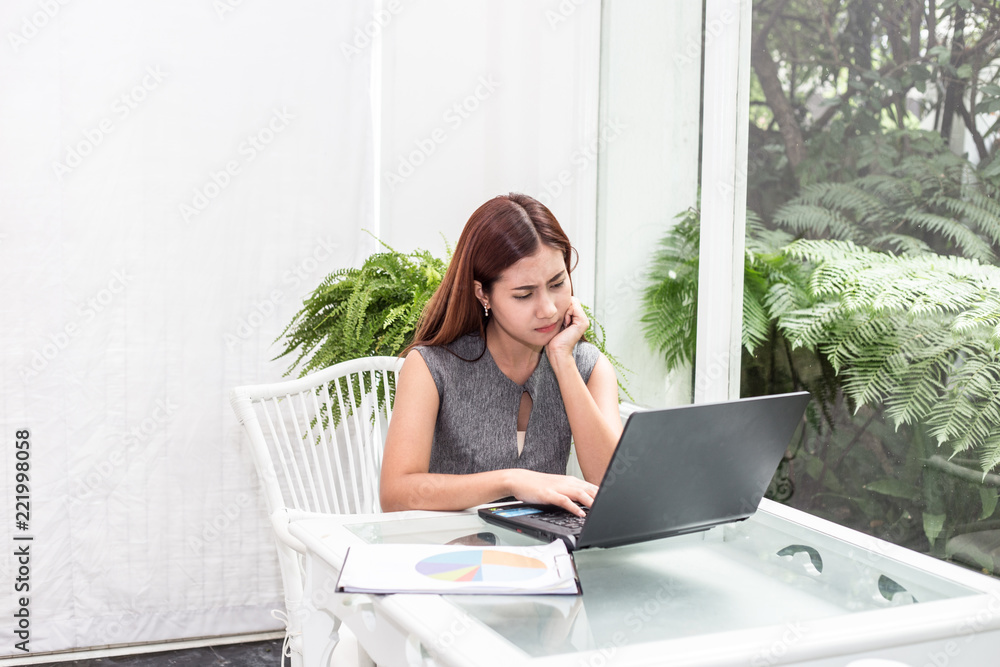 Asian Business Woman Stressed and tried after work have problem and trouble Asian Business Woman Stressed and tried after work have problem and trouble