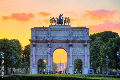 The Arc de Triomphe du Carrousel at sunset in Paris, France