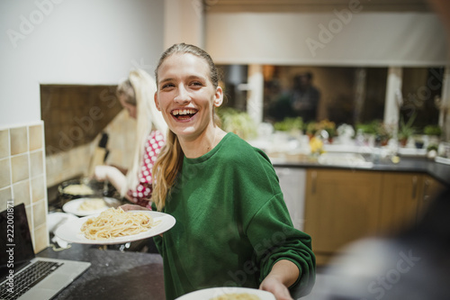 Serving Food at a Home Dinner Party photo