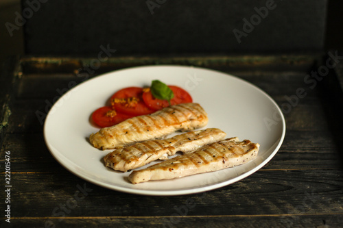 meat chicken grill - serving in a white plate - fry meat. food background. top view and copy space