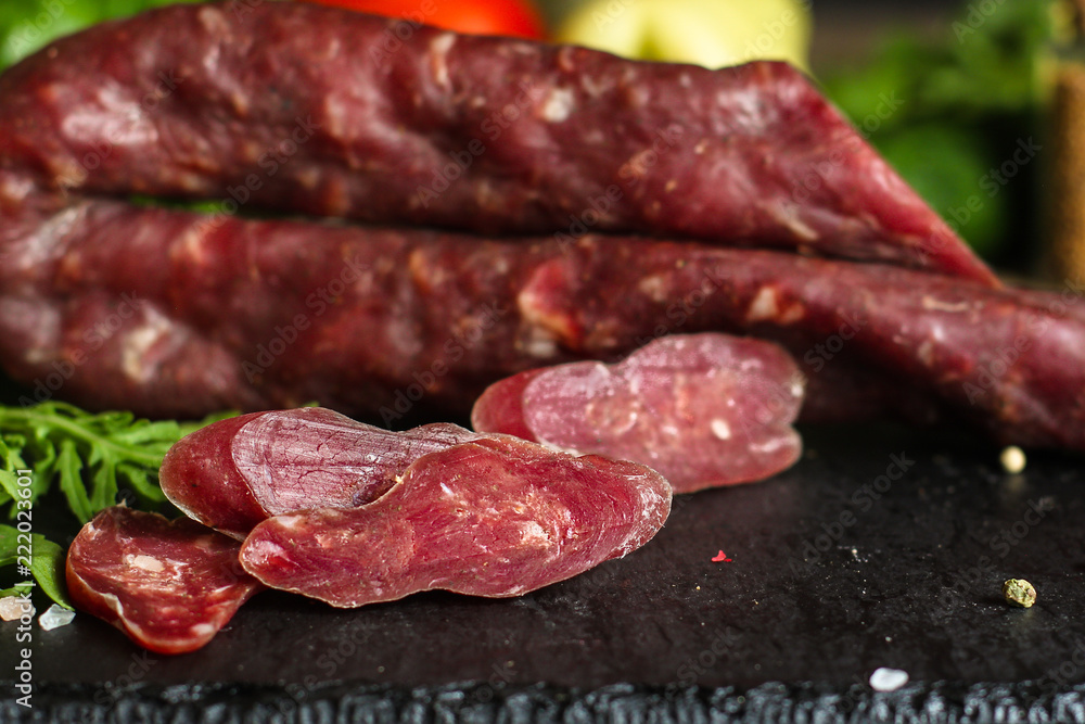 meat smoked jerky - raw meat sausage meat. food background. top view and copy space