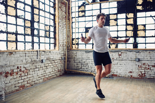 Caucasian Man Jumps Rope