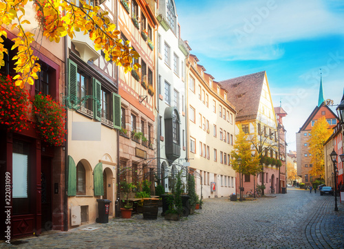 Historic street in old town of Nuremberg, Germany at fall, retro toned
