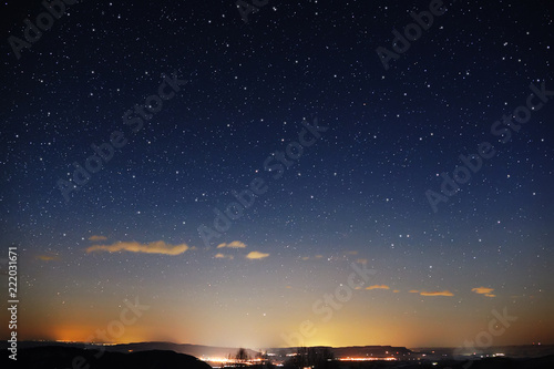 Night landscape. View of the starry sky in winter in the foothills of the Caucasus