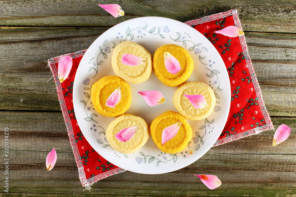 Popular traditional Indian gujarati mithai or sweet penda garnish with rose petal ภาพถ่ายสต็อก