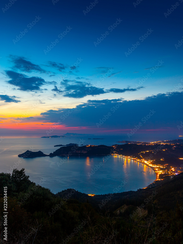 View from the hill to Agios Georgios bay with the long beach at Corfu island Greece