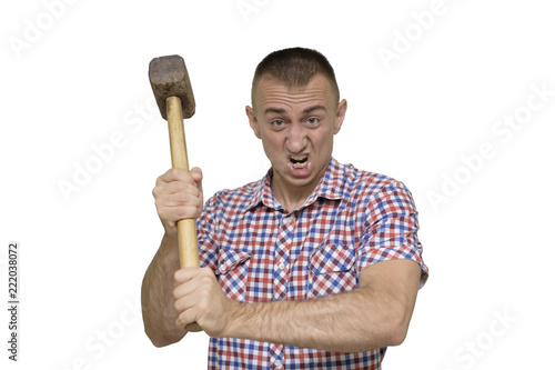 Aggressive man with a sledgehammer on a white background. Work concept. Isolate