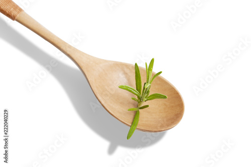 Fresh rosemary on white background. Aromatic herb for cooking