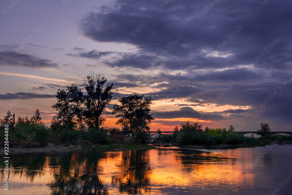 Fototapeta premium Beautiful sunset scene on the river