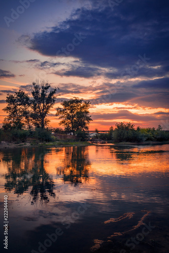 Beautiful sunset scene on the river © ionutpetrea