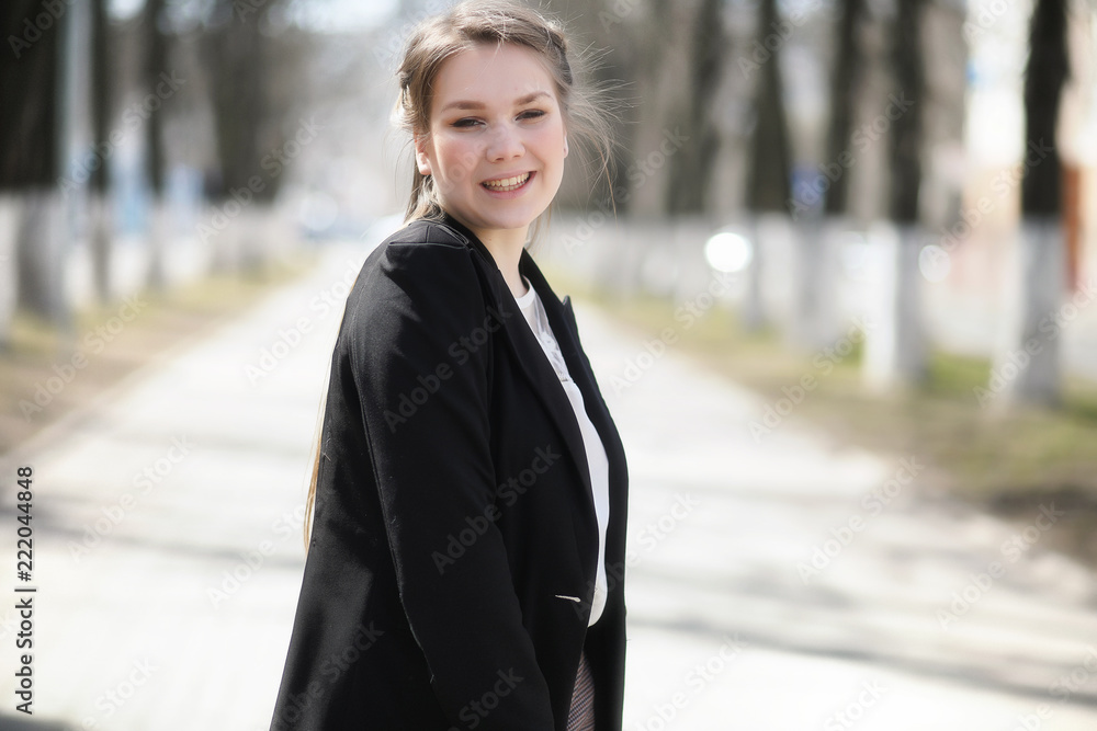 Cute girl in an autumn park