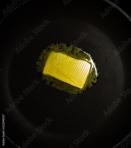 Melting butter/margarine in a heated pan