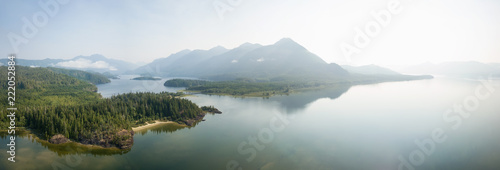 Aerial panoramic landscape view of Kennedy Lake during a cloudy summer day. Taken near Tofino and Ucluelet  Vancouver Island  BC  Canada.