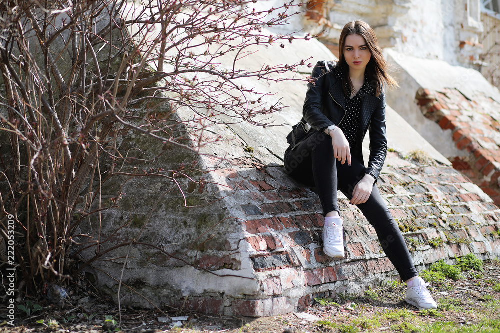 Girl on a walk through the spring city Girl on a walk through the spring city