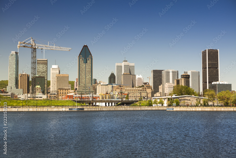 Downtown city skyline showing St. Lawrence River, Montreal, Quebec, Canada