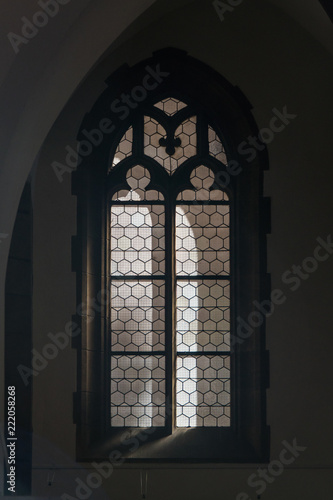 Old Window in the curch Rustic old charming traditional architecture colonial historic castle building Eastern European.