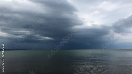 Storm off in the distance over lake superior photo