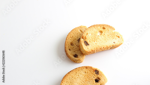 Fotografie hardtack biscuits with raisins on white background