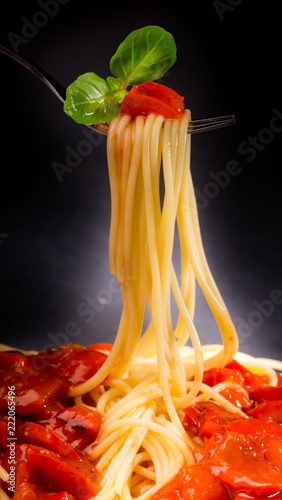 Spaghetti on a Fork with Tomato Sauce and Basil