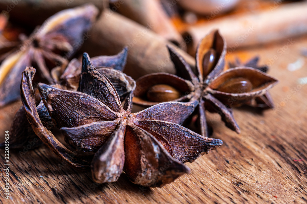 close up of star anise on wooden plank, slective focus close up of star anise on wooden plank, slective focus