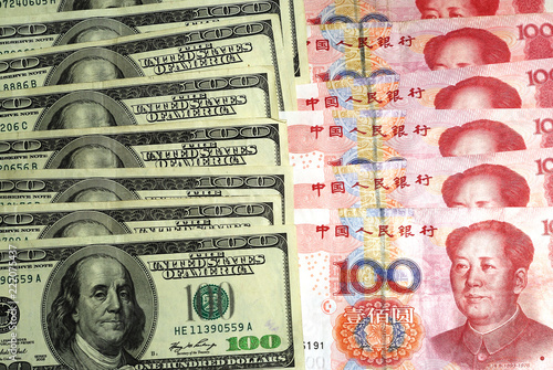 Canvas Print US currency dollar vs Chinese currency yuan