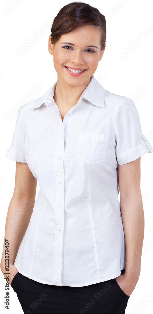 Happy Businesswoman Standing with Hands in Pockets - Isolated Happy Businesswoman Standing with Hands in Pockets - Isolated