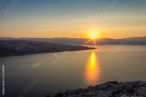 Nice sunset on sea with mountain, island Krk Croatia © Space Creator