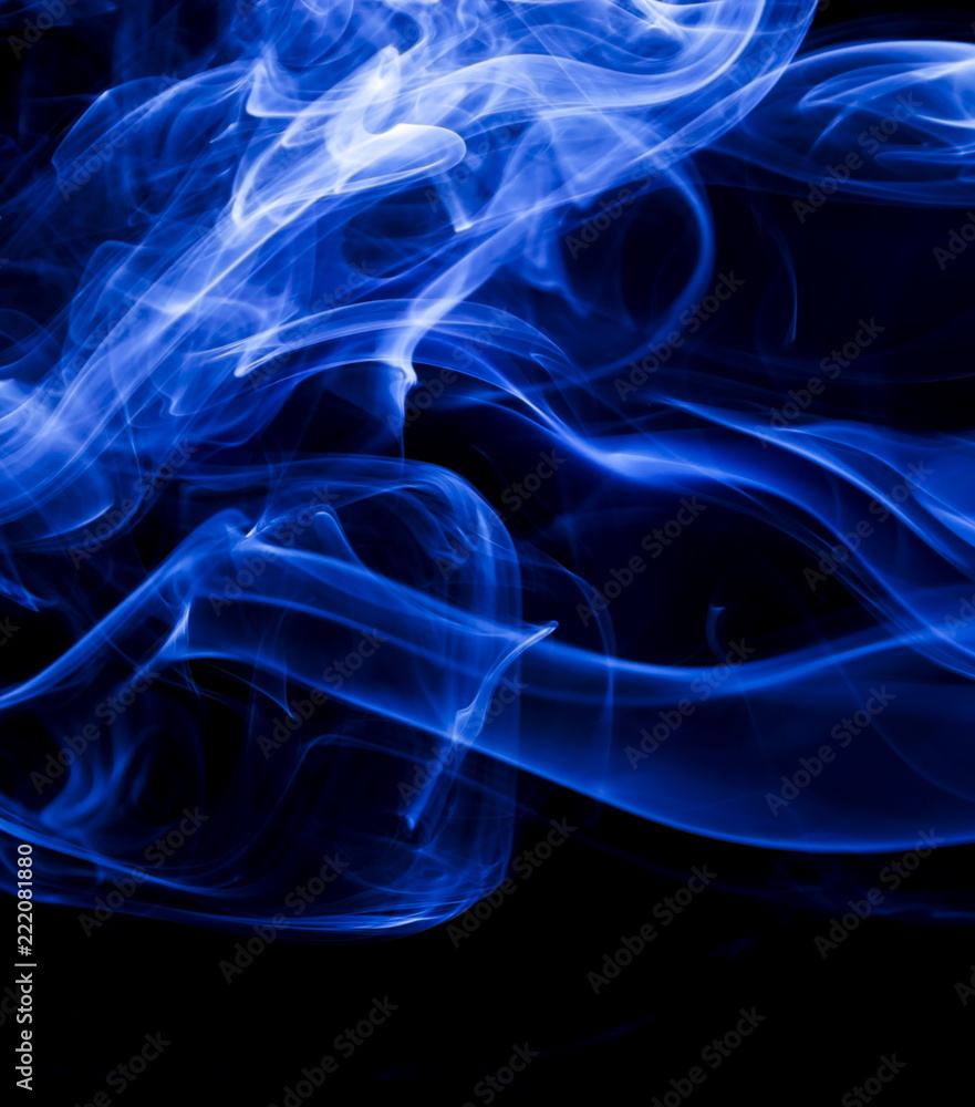 Obraz premium Blue smoke on black background