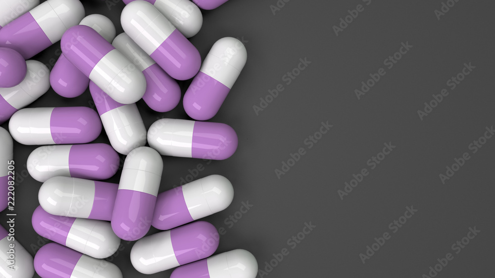 Pile of white and purple medicine capsules Pile of white and purple medicine capsules