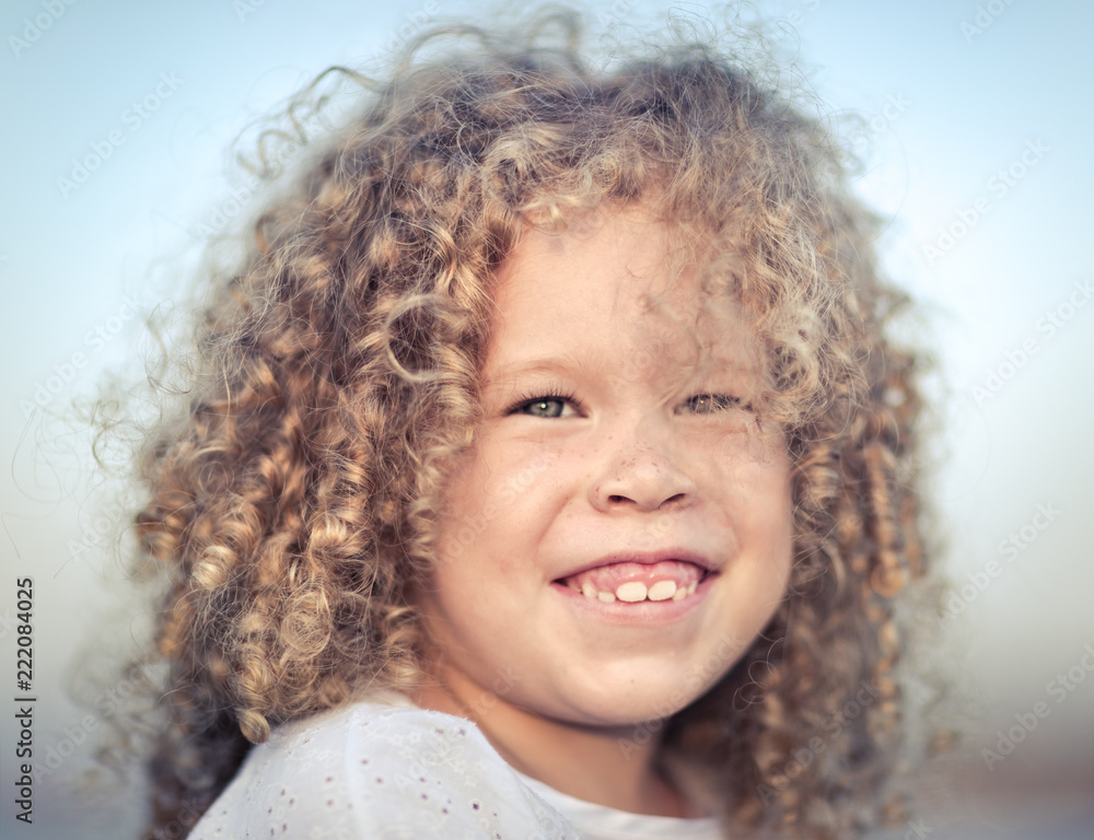 Portrait of a smiling little girl. Portrait of a smiling little girl.