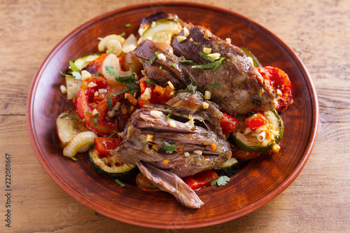 Slow cooker lamb with vegetables and garlic