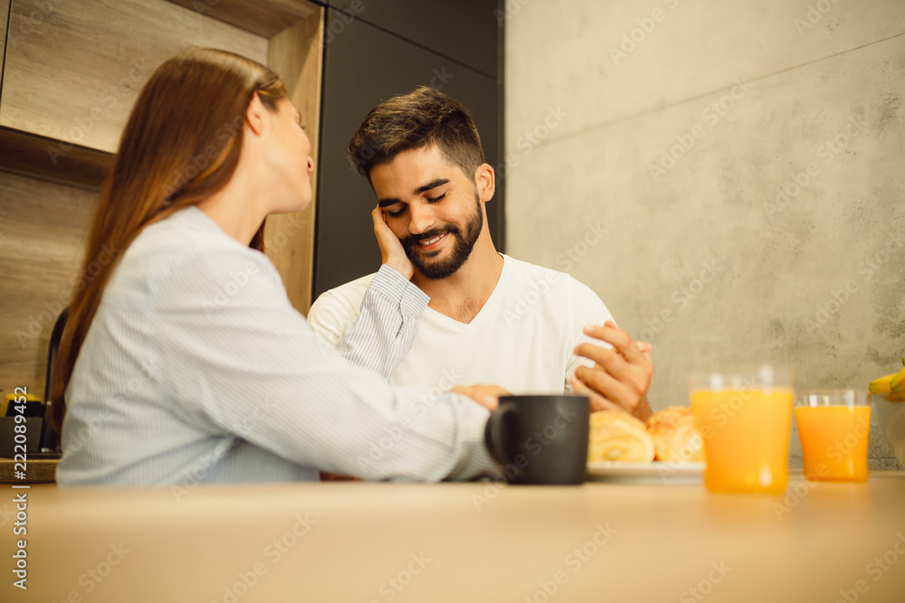 Portrait of couple enjoying morning moments while they having breakfast Portrait of couple enjoying morning moments while they having breakfast