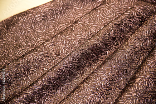Brown fabric for dress  With patterns In the form of roses