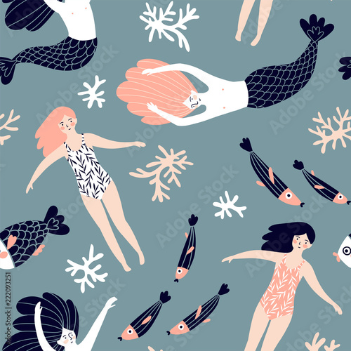 Cute hand-drawn seamless pattern with mermaids, swimming girls and corals. Magic endless design for fabric, wrap paper or wallpaper.