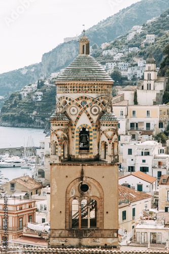 Fototapeta Naklejka Na Ścianę i Meble -  Amalfi coast in Italy, the most beautiful city. Streets and old architecture, narrow passages, shops and cafes. View from the sea and above