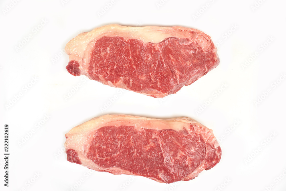 fresh raw steak isolated on white background.