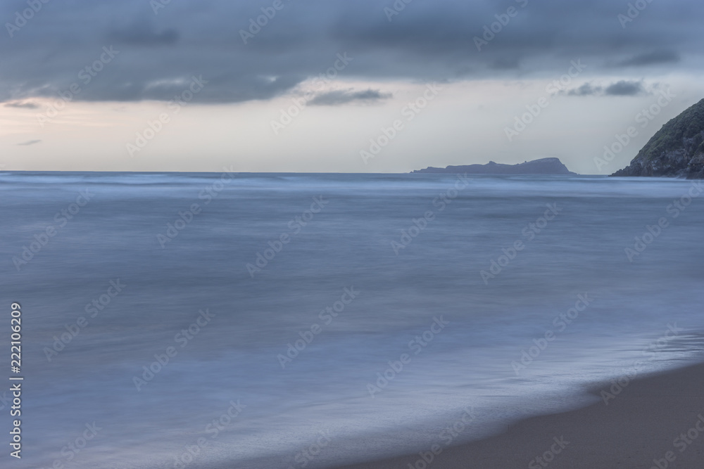 Long exposure photography of the Cantabrian sea and the Izaro island