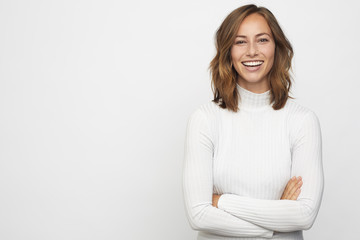 portrait of young happy woman looks in camera