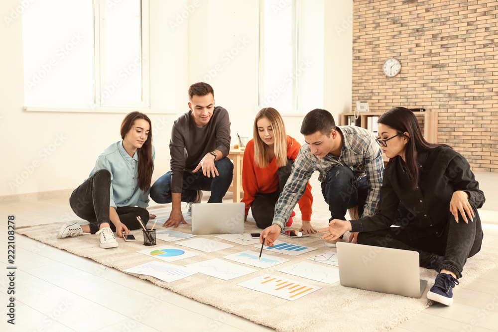 Fototapeta premium Young people having business meeting indoors