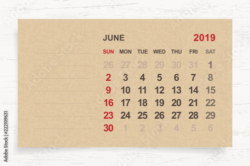 June 2019 - Monthly calendar on brown paper and wood background with area for note. Vector.