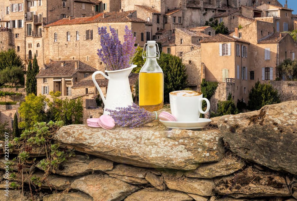 Obraz premium Lavender still life with cup of coffee against Gordes village in Provence, France