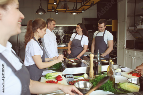 Chef and group of young peo...