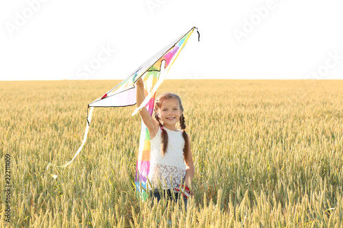 Cute little girl with kite ...