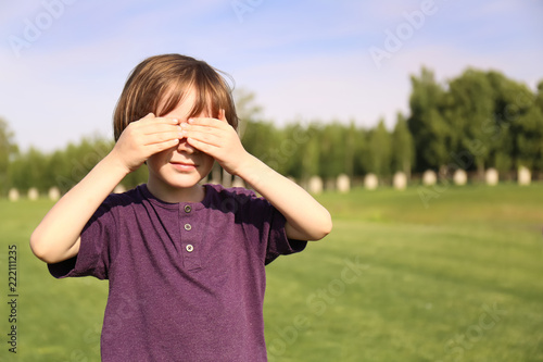 Cute little boy relaxing in...
