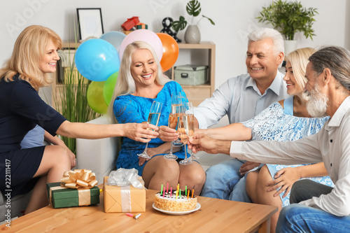 Mature people celebrating b...